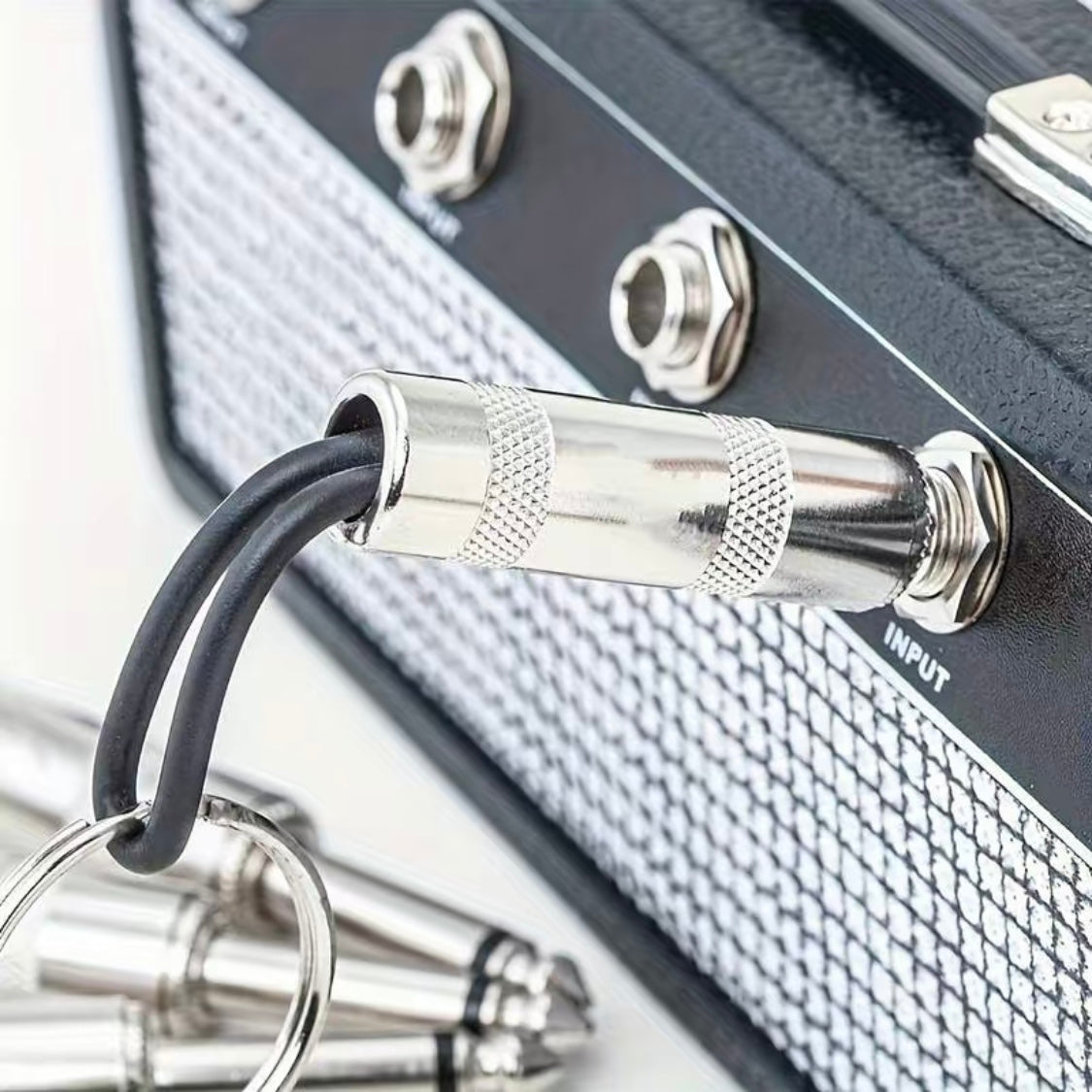 Fender Jack Rack™ | Wandhalterung + 4 AMP Schlüsselanhänger